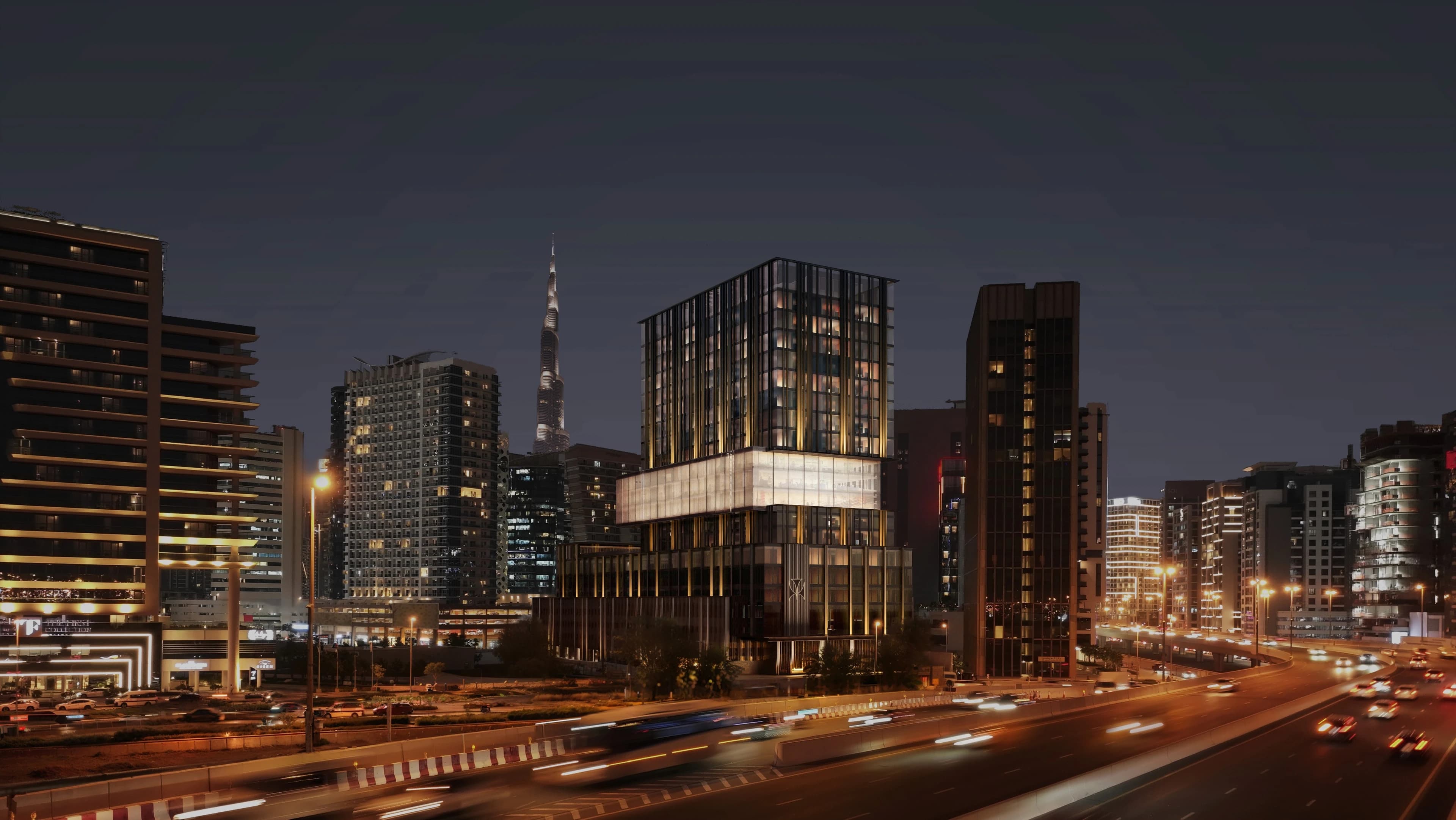Developer visualisation of Haus of Tenet offices and surrounding Business Bay buildings at dusk