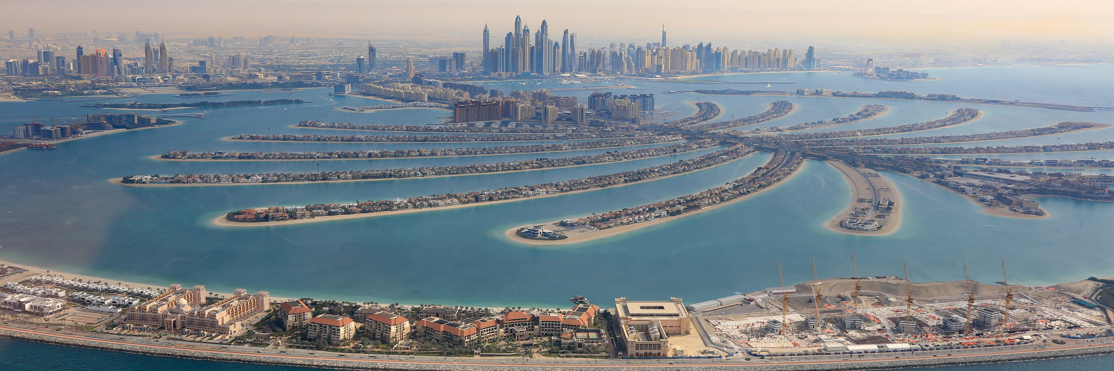 Real aerial photograph of Palm Jumeirah and Dubai Marina