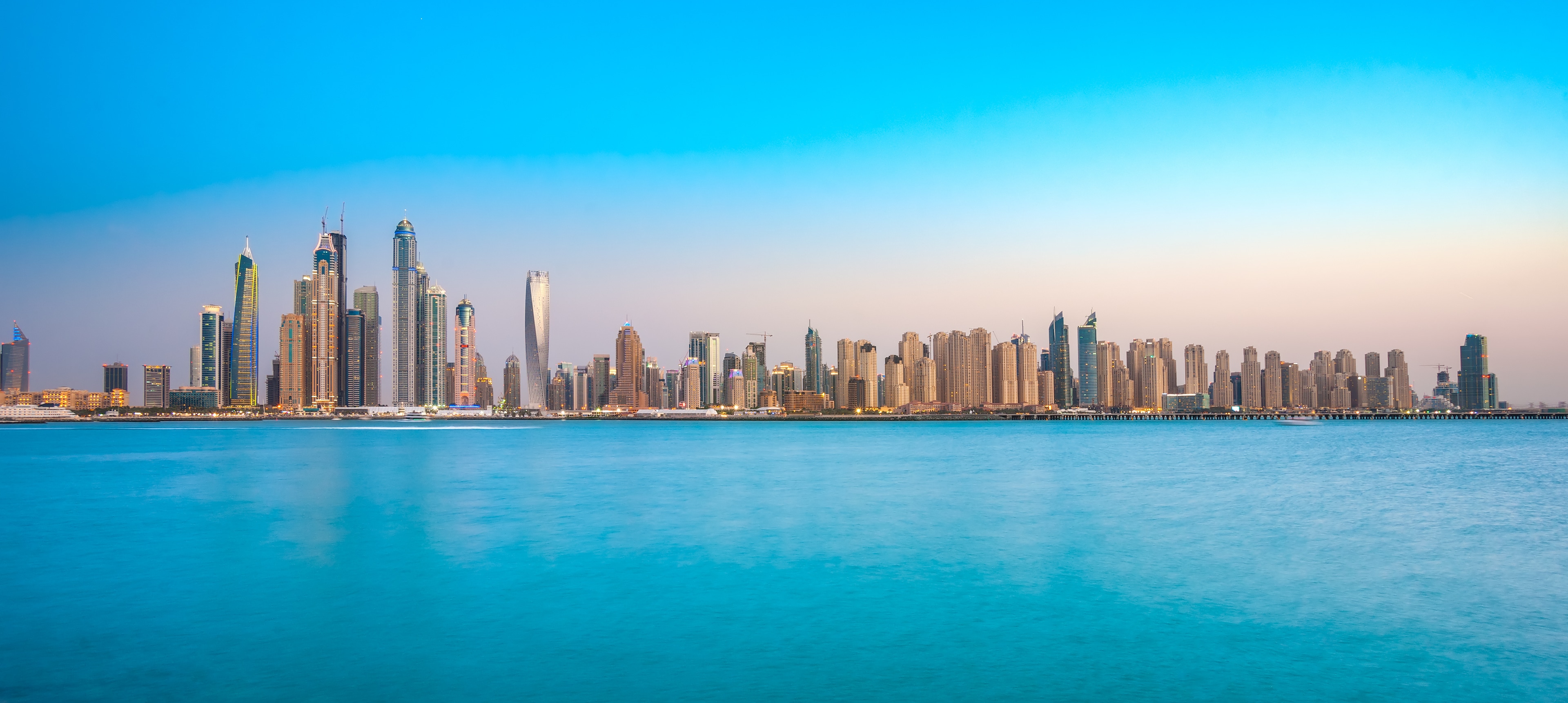 Real panoramic photograph of Dubai Marina at dusk