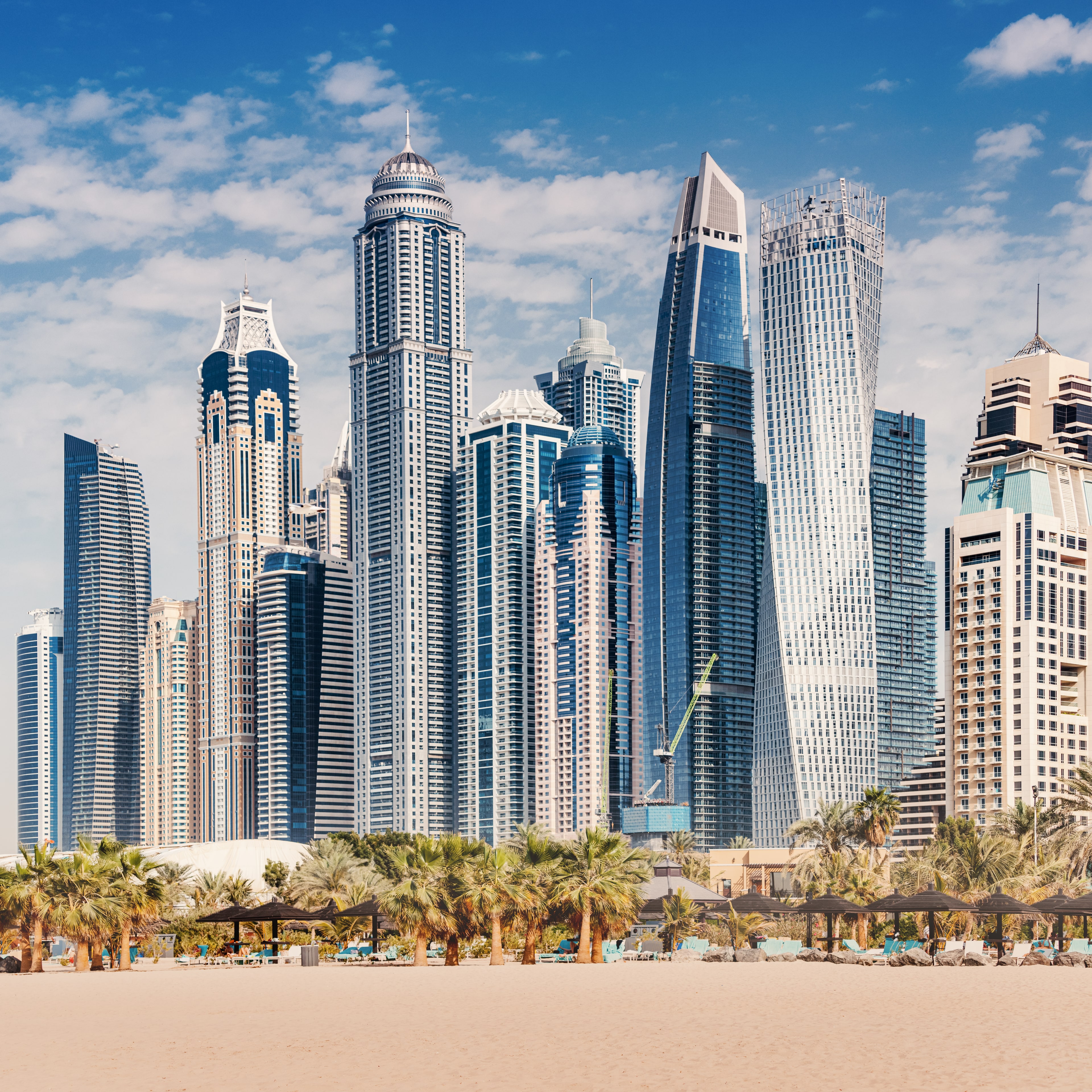Real photograph of Dubai Marina towers and beachfront